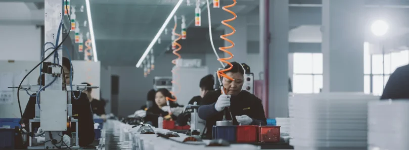 Assembly line workers at a manufacturing facility in Vietnam